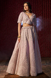 Silk Lehenga with Minimalist Embroidery and Soft Pastel Tones